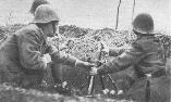 Romanian soldiers firing a 60 mm mortar