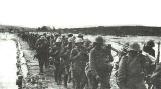 Romanian infantry crossing the river Donetsk. One of the soldiers is carrying a ZB 30 LMG