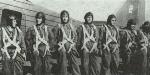 Romanian paratroopers near a Potez 56 transport airplane