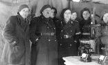 Mountain troop officers near a telephone switching center in a command tent. Probably before the war