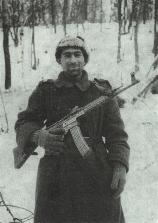 A sergeant from the 18th Infantry Division armed with a German Sturmgewehr 44

