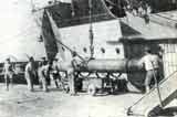 Loading a torpedo aboard of CONSTANTA.